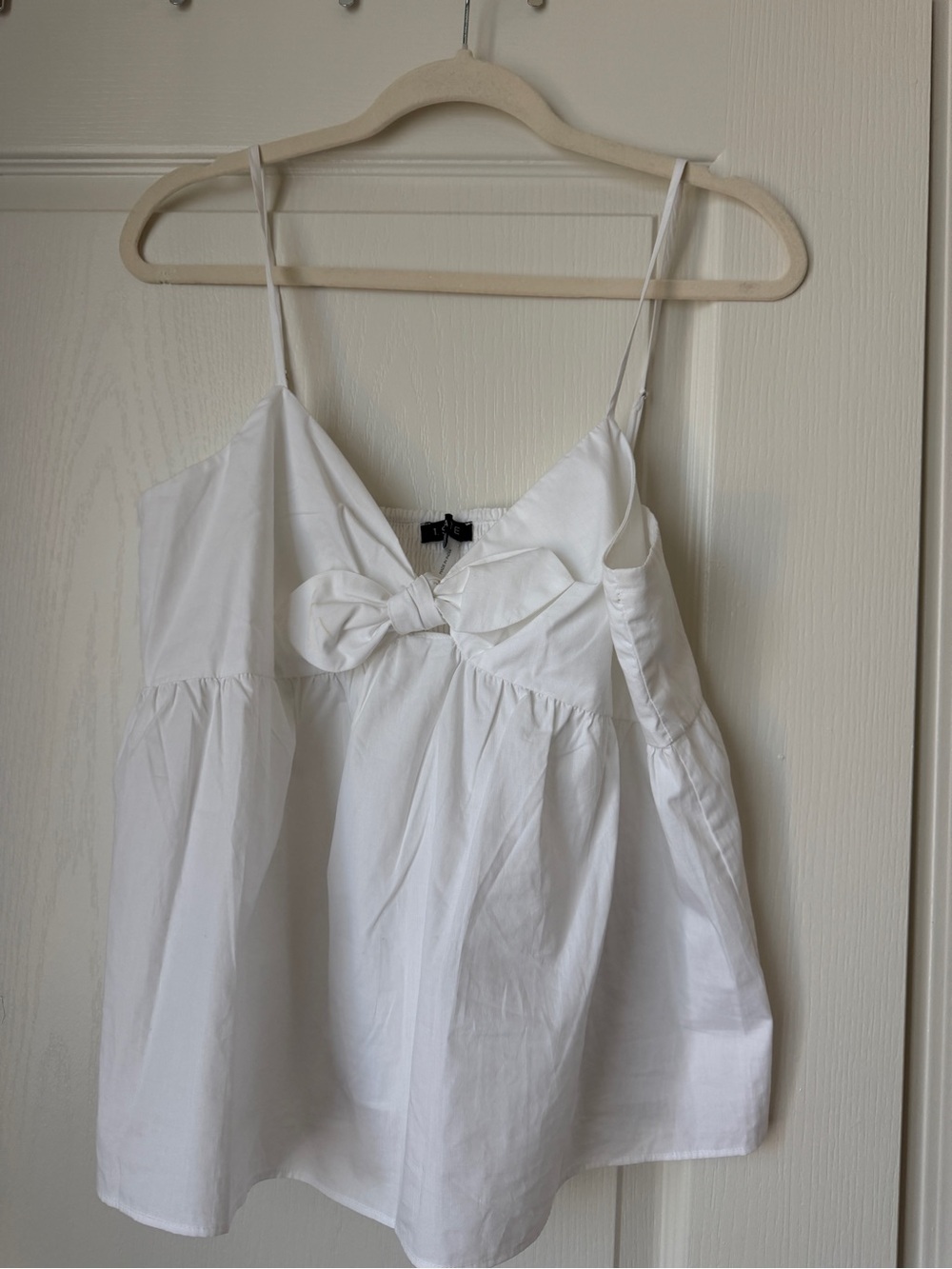 1. State White Bow-Front Spaghetti Strap Camisole